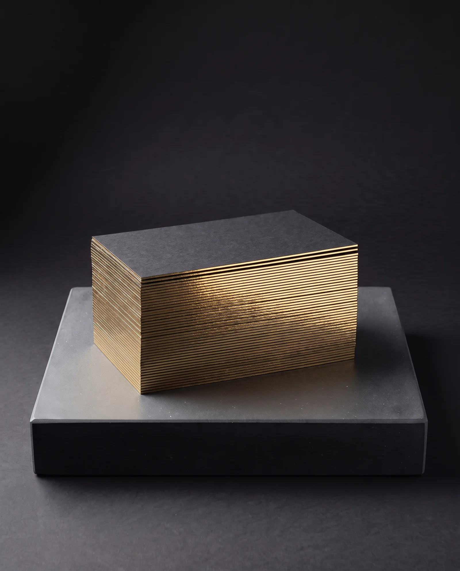 Black duplex cards with a mirror gold foiled edge.