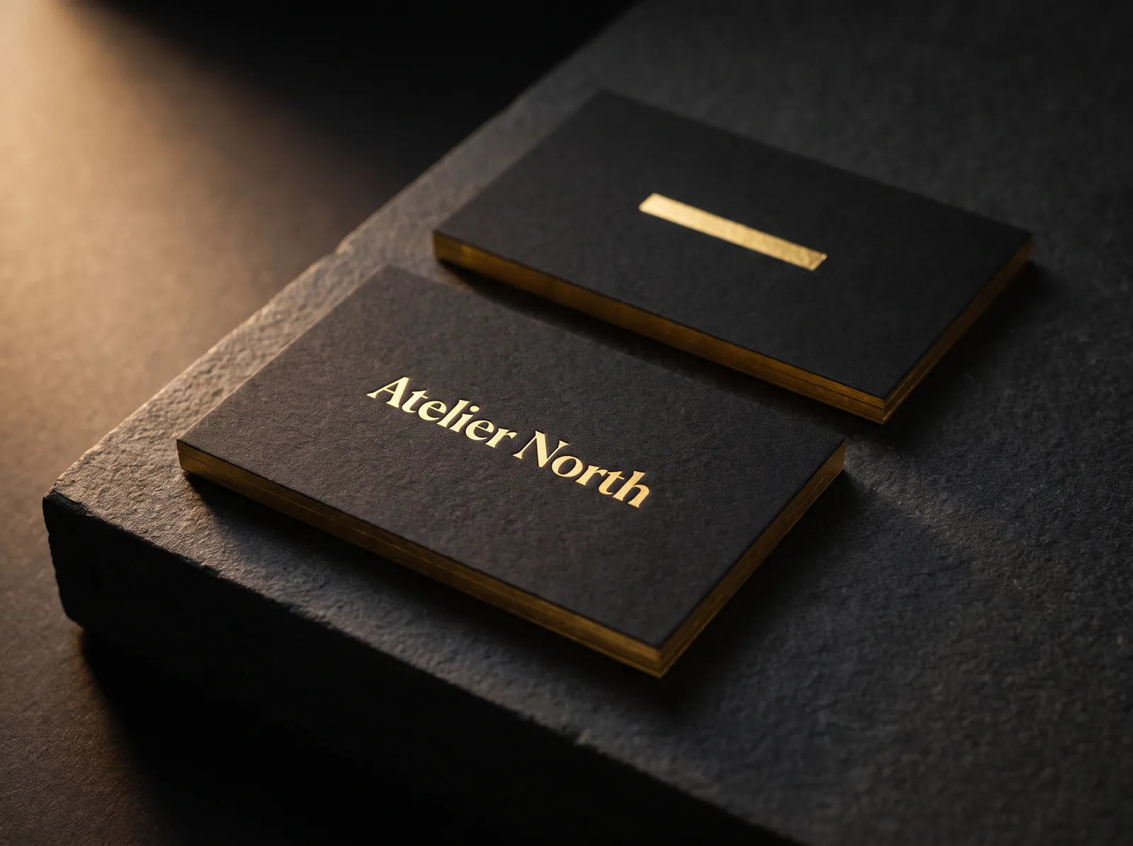 Black gold business cards in 48pt: gold foil on front and back and gold foil edges, square corners