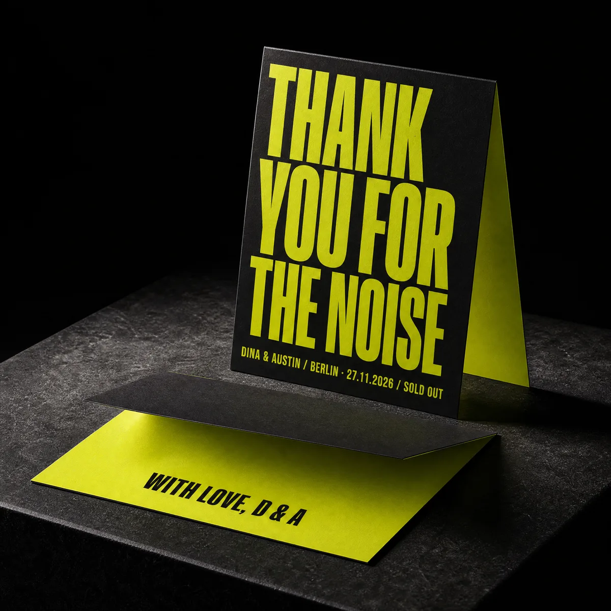 Folded wedding thank-you card styled as a mini tour poster, soft-touch black with fluorescent chartreuse, by Print Peppermint