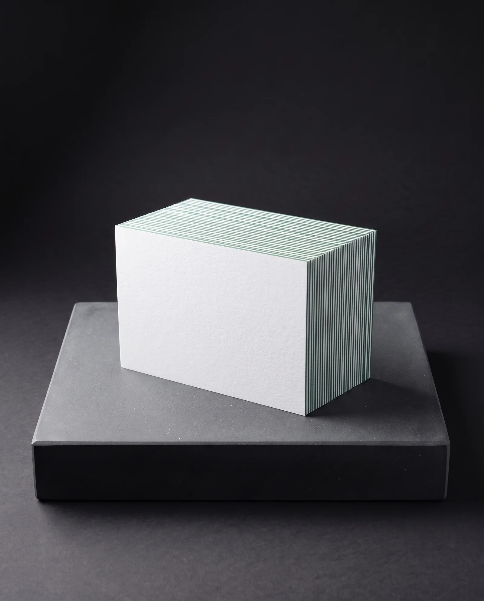 Thin notecards with a fine green painted edge.