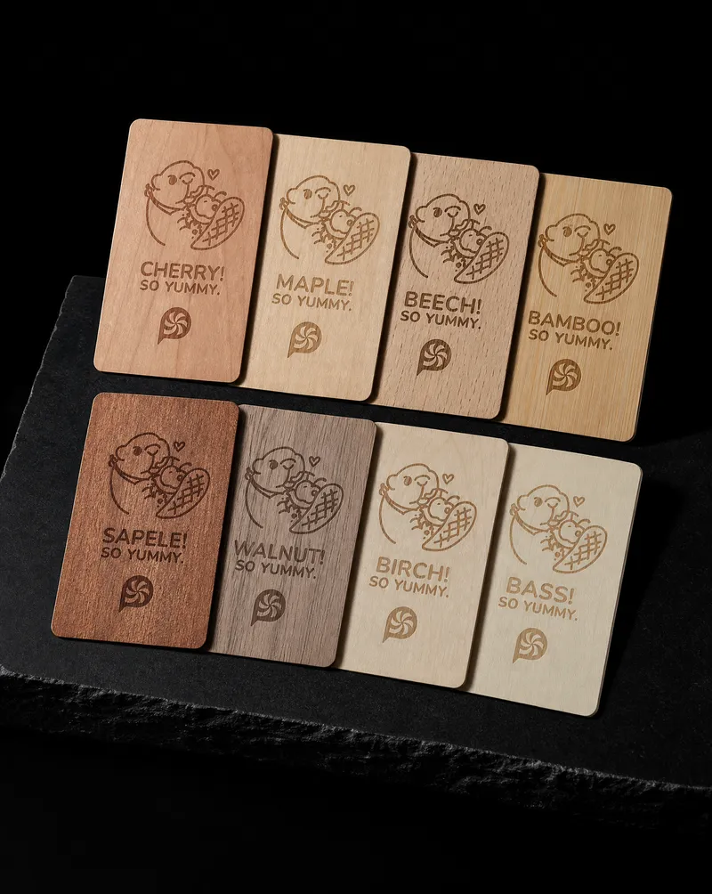 Laser-engraved wood business cards in eight species from our sample pack