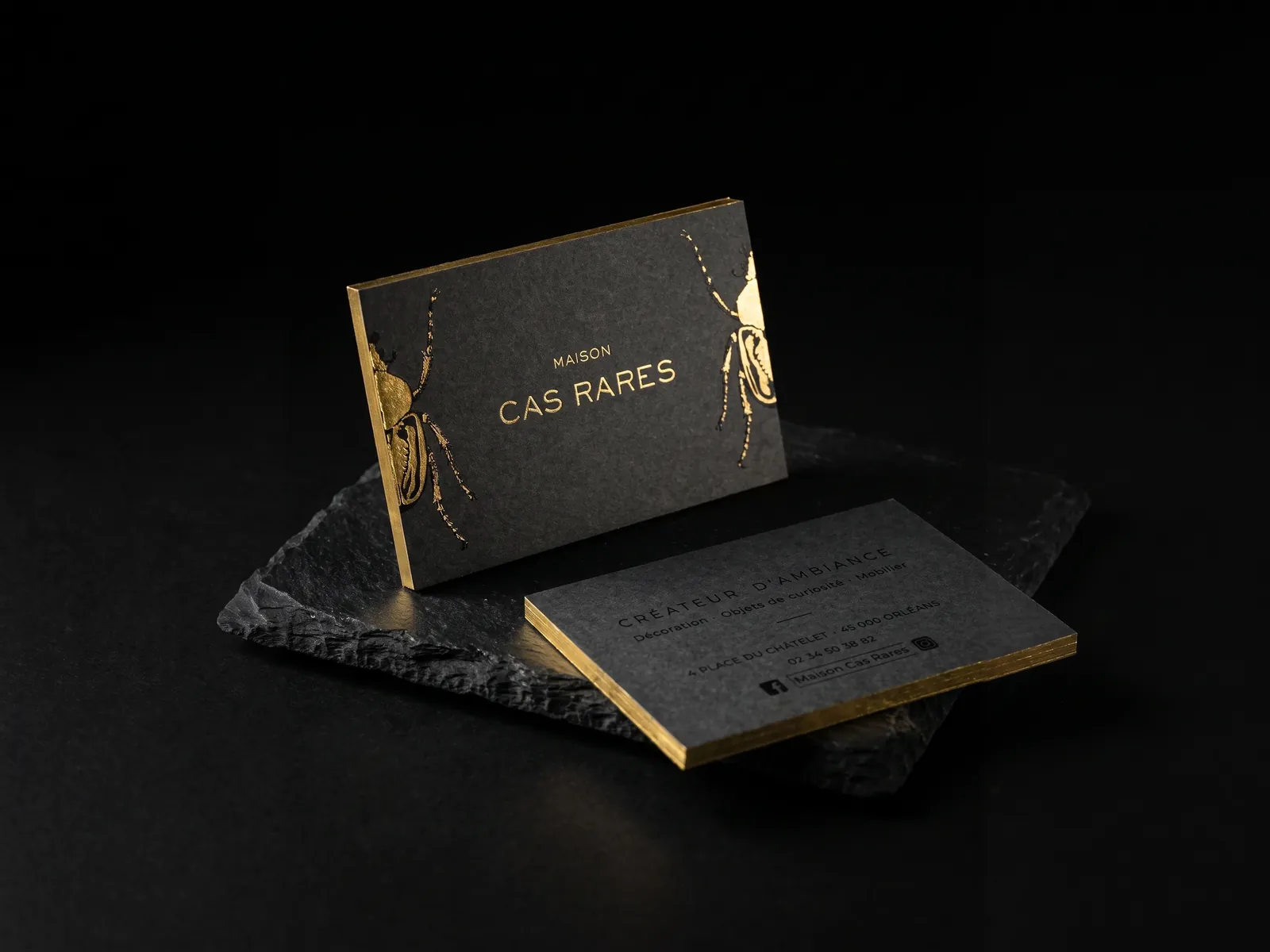 Maison Cas Rares business card: gold foil on charcoal stock, foiled edge