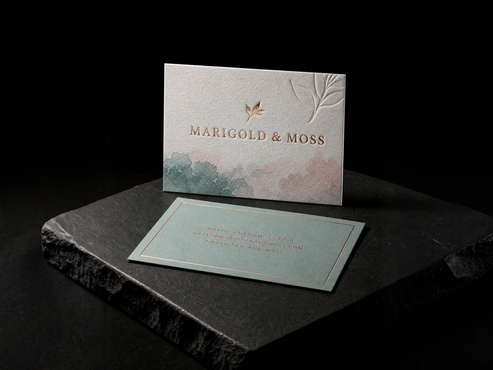 Marigold & Moss business card: copper foil and deboss on cotton