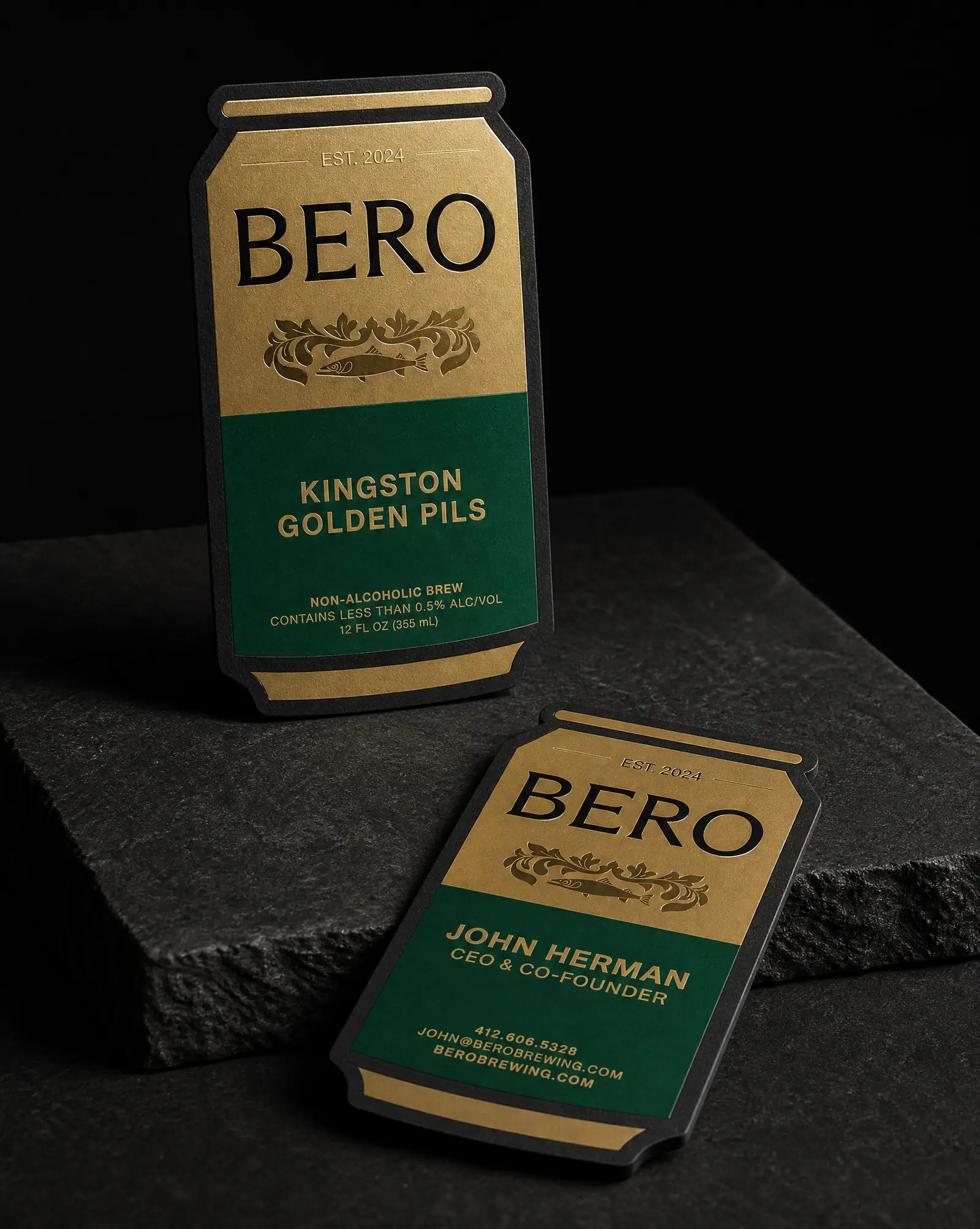 BERO Brewing business cards die-cut to the shape of a can, with gold, green and clear foil on black