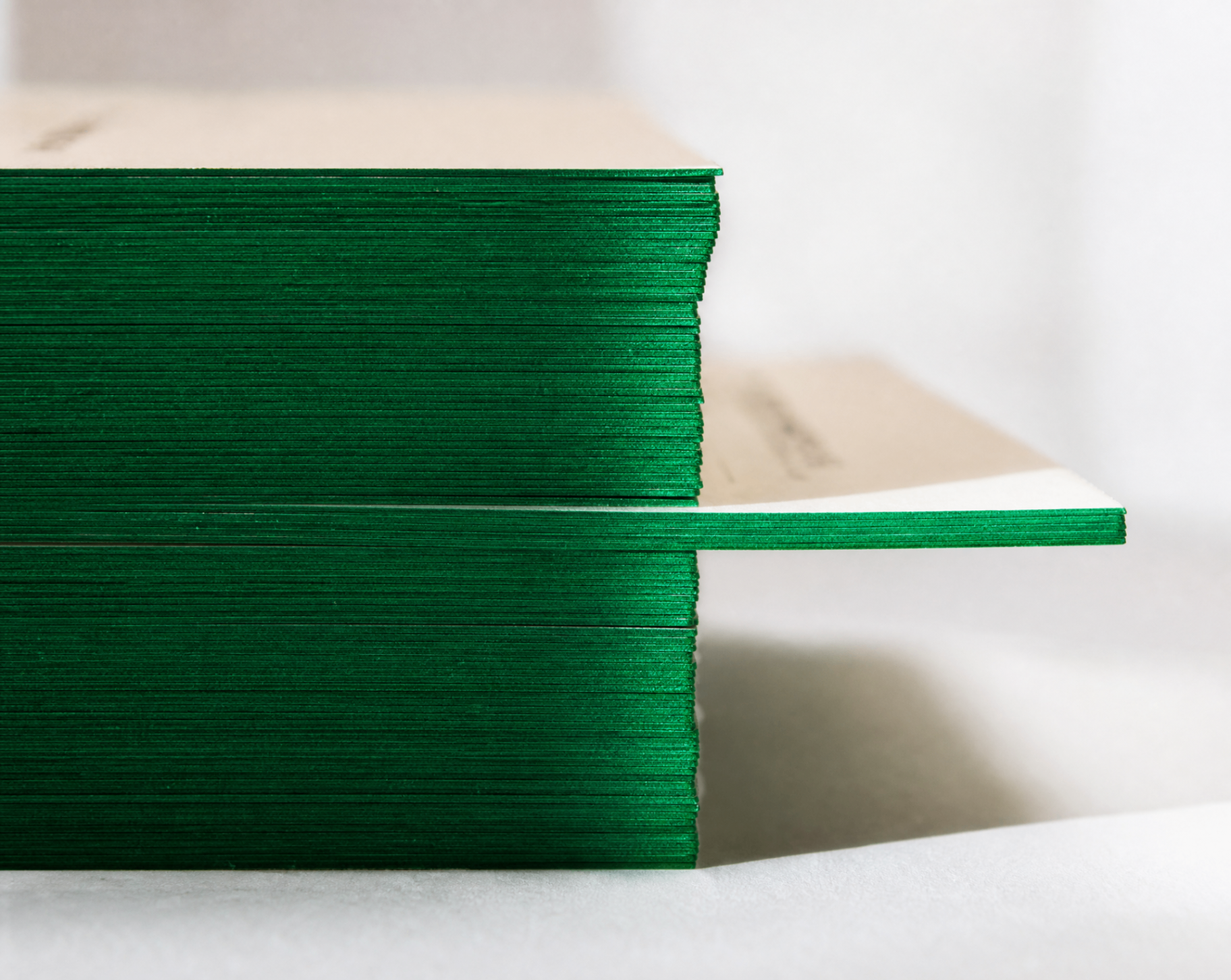 Racing green painted edge — Edge paint against a bright core