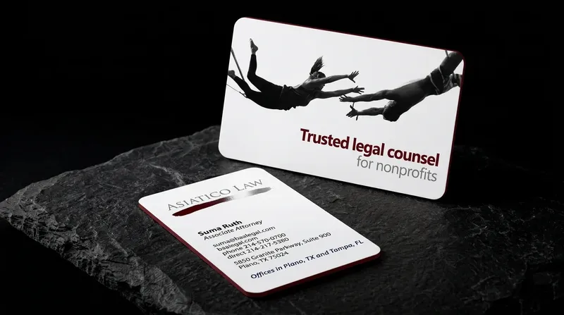 Law firm business card with a trapeze photograph, rounded corners and a red painted edge