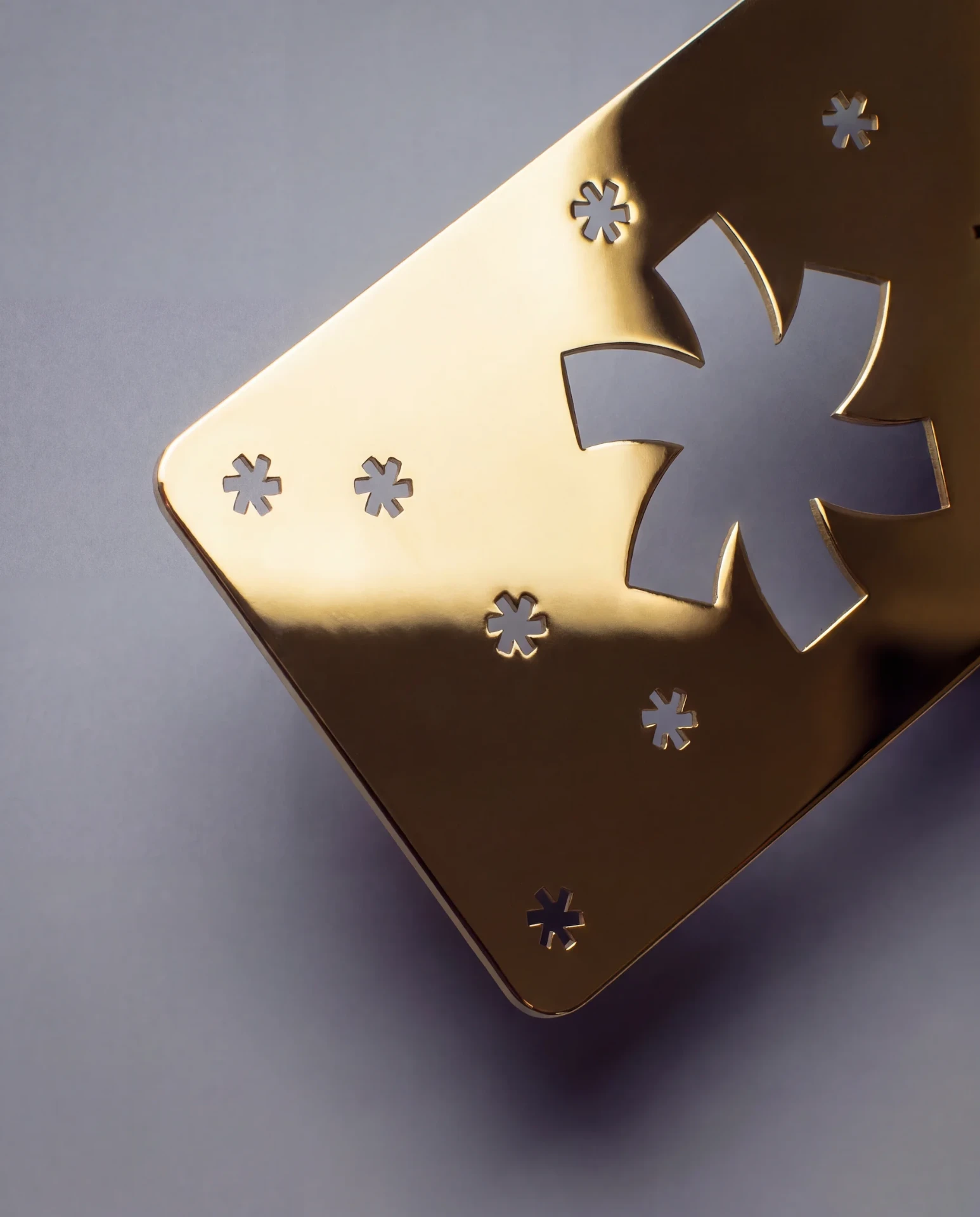 Gold metal business card with warm 18K gold tone PVD coating