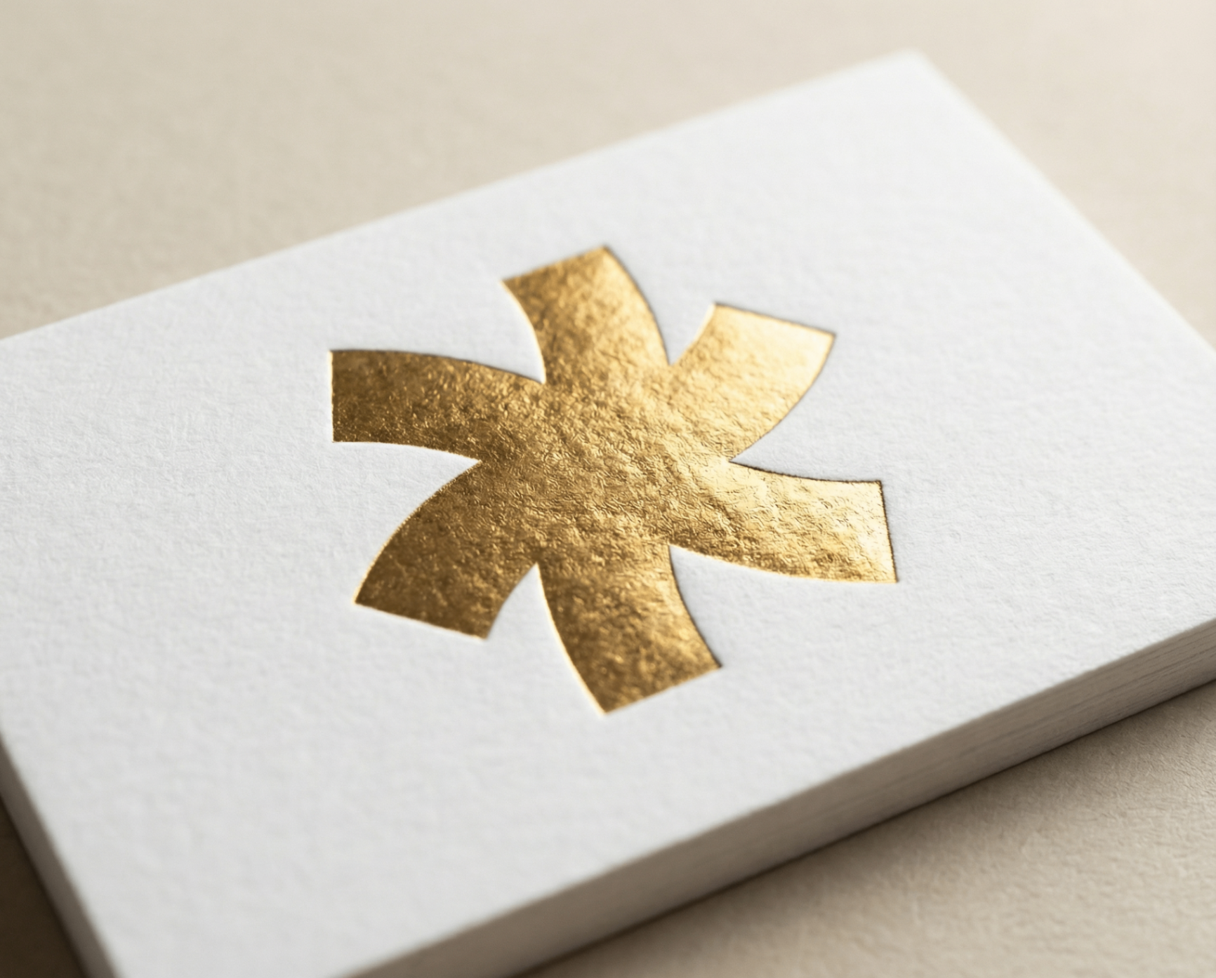 Macro detail of hot foil finish on business card