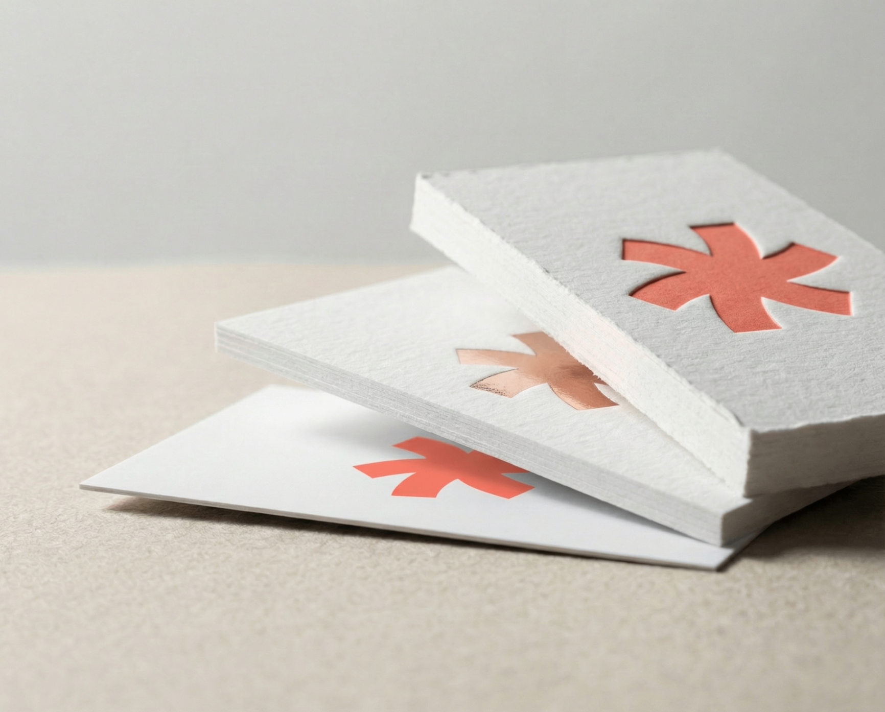 Stack of business cards showing Quick Ship and Studio tiers