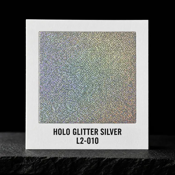 Holo Glitter Silver L2-010 foil chip photographed on slate