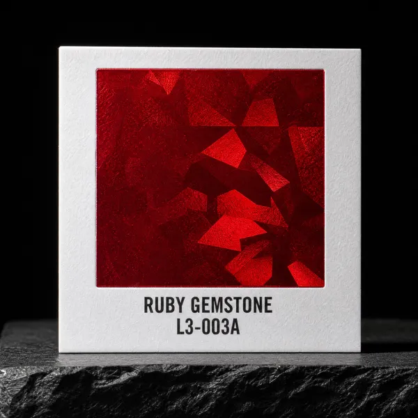 Ruby Gemstone L3-003A foil chip photographed on slate