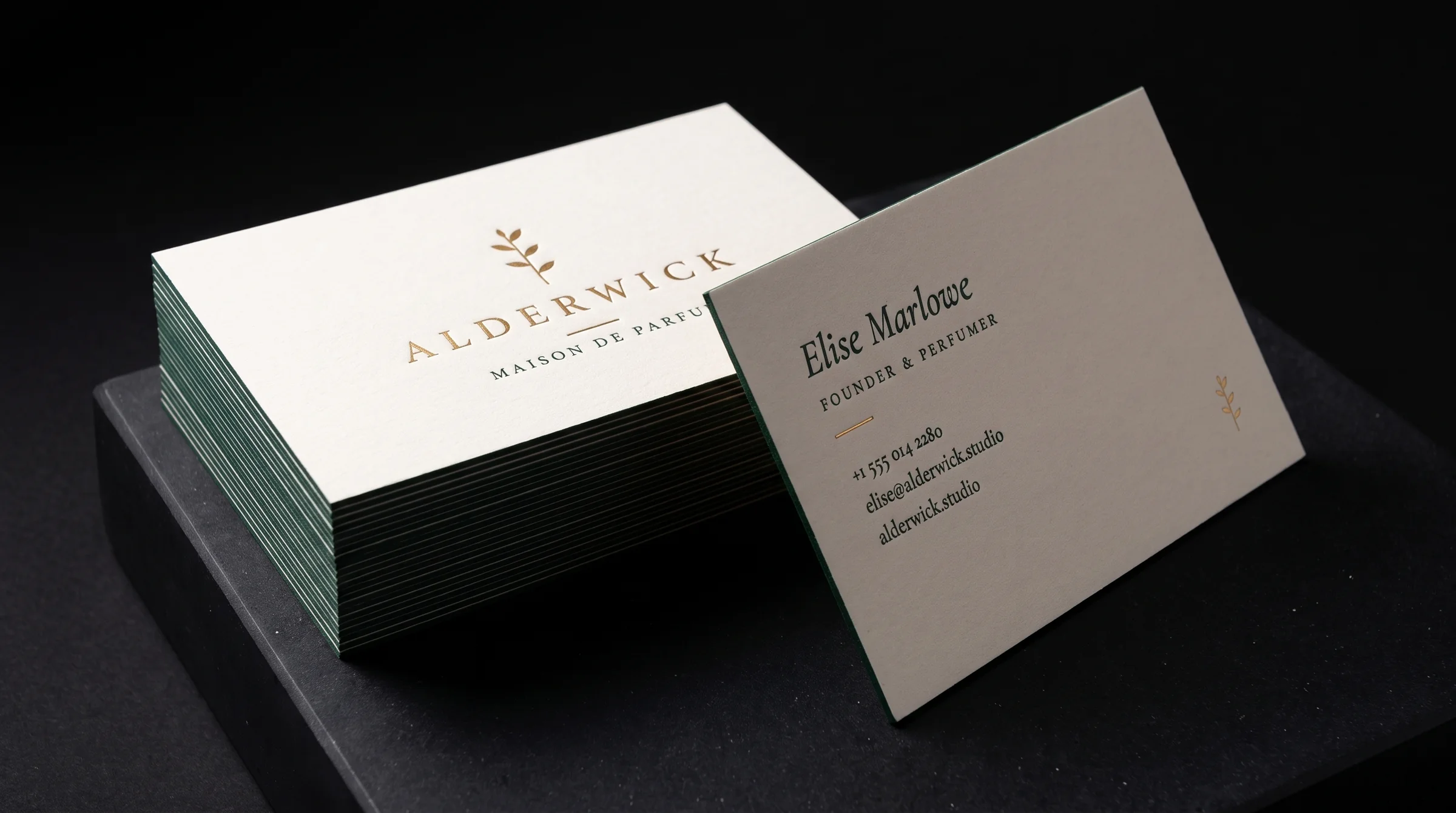 Production simulation of the Maison Alderwick card: gold foil and green letterpress on thick ivory cotton